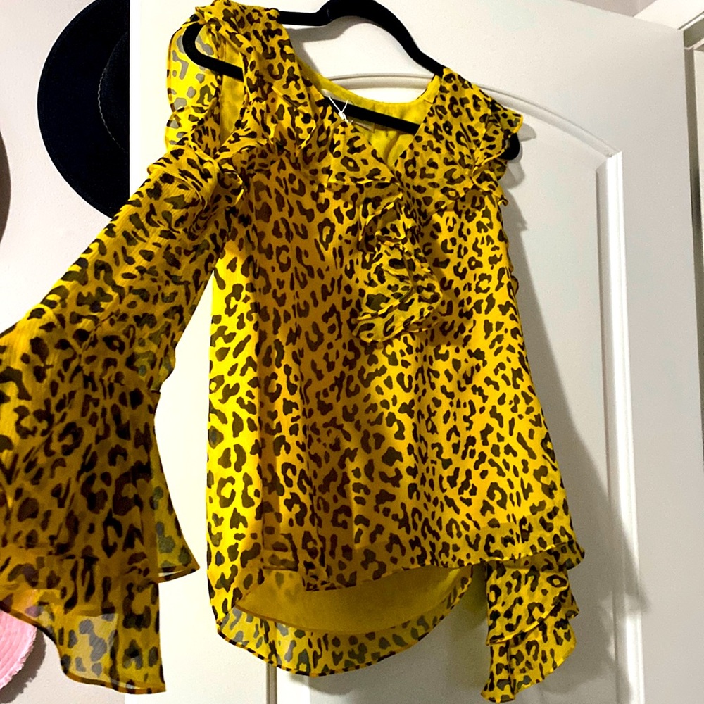 DVF yellow black cheetah print blouse.
